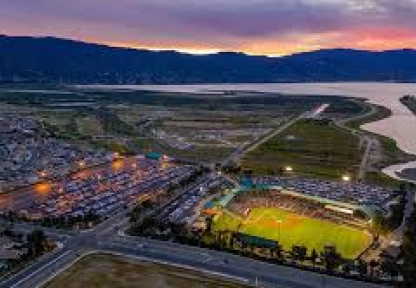 Aerial nighttime view of Lake Elsinore highlighting the areas for visitors to stay.