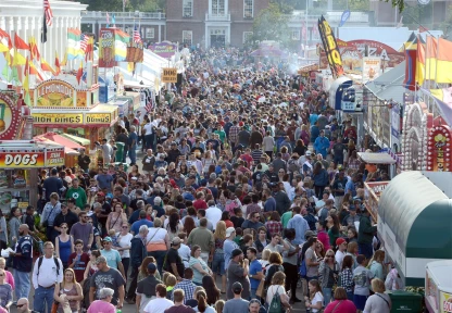 Crowded outdoor event with people at the Easter States Exposition in Agawam