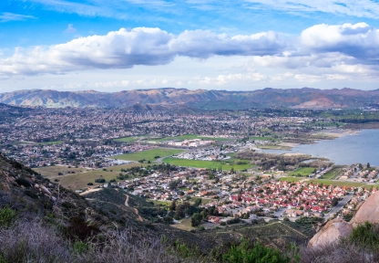 Aerial nighttime view of Lake Elsinore highlighting the areas for visitors to stay.